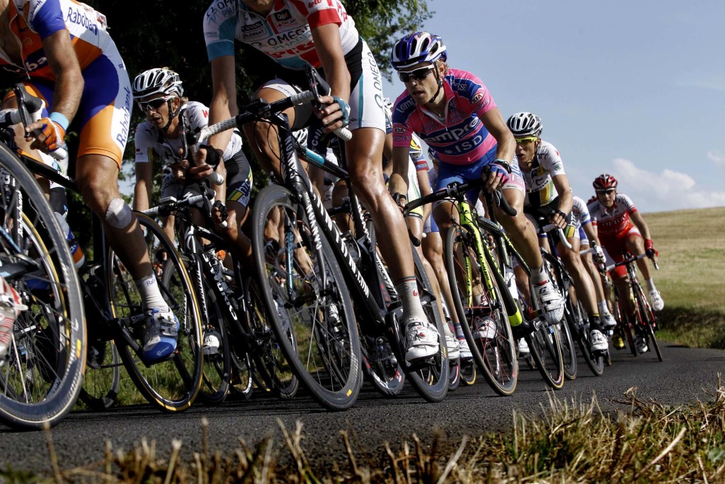 The pack rides durig the ninth stage. (Laurent Cipriani/Associated Press)